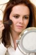 Putting on makeup