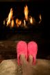 Warming feet by the fire