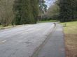 old paved path with split yellow line