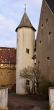 Old light stone tower in the yard the lock