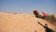 Israeli soldiers excersice in a desert