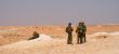 Israeli soldiers excersice in a desert