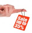hand holding sale tag