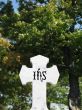 stone cross with tree