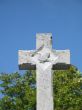 stone cross with blue sky