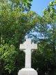 stone cross with blue sky