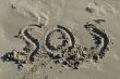 SOS in sand