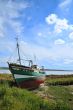 Landcape with damaged boat