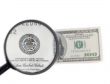 isolated magnifier with dollars