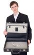 Man with suitcase containing dollar