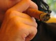 man smoking a cigar