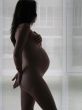 a young, healty and slim female pregnant