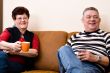 Senior couple drinking cofee and talking