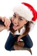 young pretty wearing christmas hat and singing