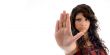 beautiful woman showing stopping gesture