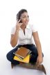 young student busy on phone call