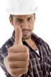 portrait of young guy gesturing thubmbs up