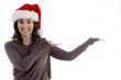 young female in christmas hat with open palms