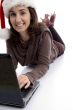 female lying on floor working on laptop