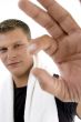 young man showing pill