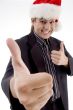businessman in christmas hat wishing goodluck