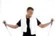 happy male with exercising rope