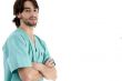 young surgeon posing with crossed arms