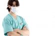 young surgeon posing with crossed arms
