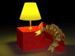 Shone lamp in a gift box. 3D image