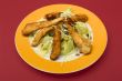 Salad with turkey stripes