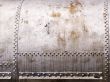 old metal tank with rivets