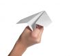 The female hand starts the paper plane