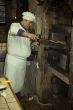 Cook cooking on the kitchen.