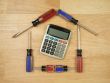 House Shaped by Screwdrivers and Calculator