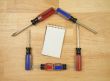 House Shaped by Screwdrivers and Pad of Paper
