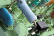 close-up chip on green motherboard