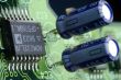 close-up chip on green motherboard