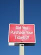 purchased ticket sign and blue sky