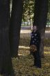 Woman walking in the autumn park