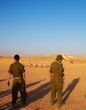 Israeli soldiers excersice in a desert