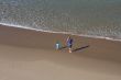 Father and son playing on the beach