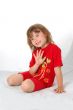 Portrait of little girl on red. Smile face