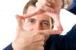 Businessman making a frame with his hands