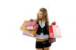 Happy young woman on a shopping spree