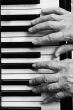 Fingers and piano. Hands of the old person