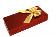 Dark red gift box with golden ribbon isolated on the white