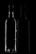 Two wine bottle on black