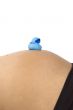 30 weeks pregnant teenager with blue duck on her belly