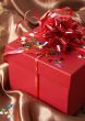 Red gift box with bows and stars