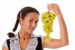 beautiful girl with green grapes